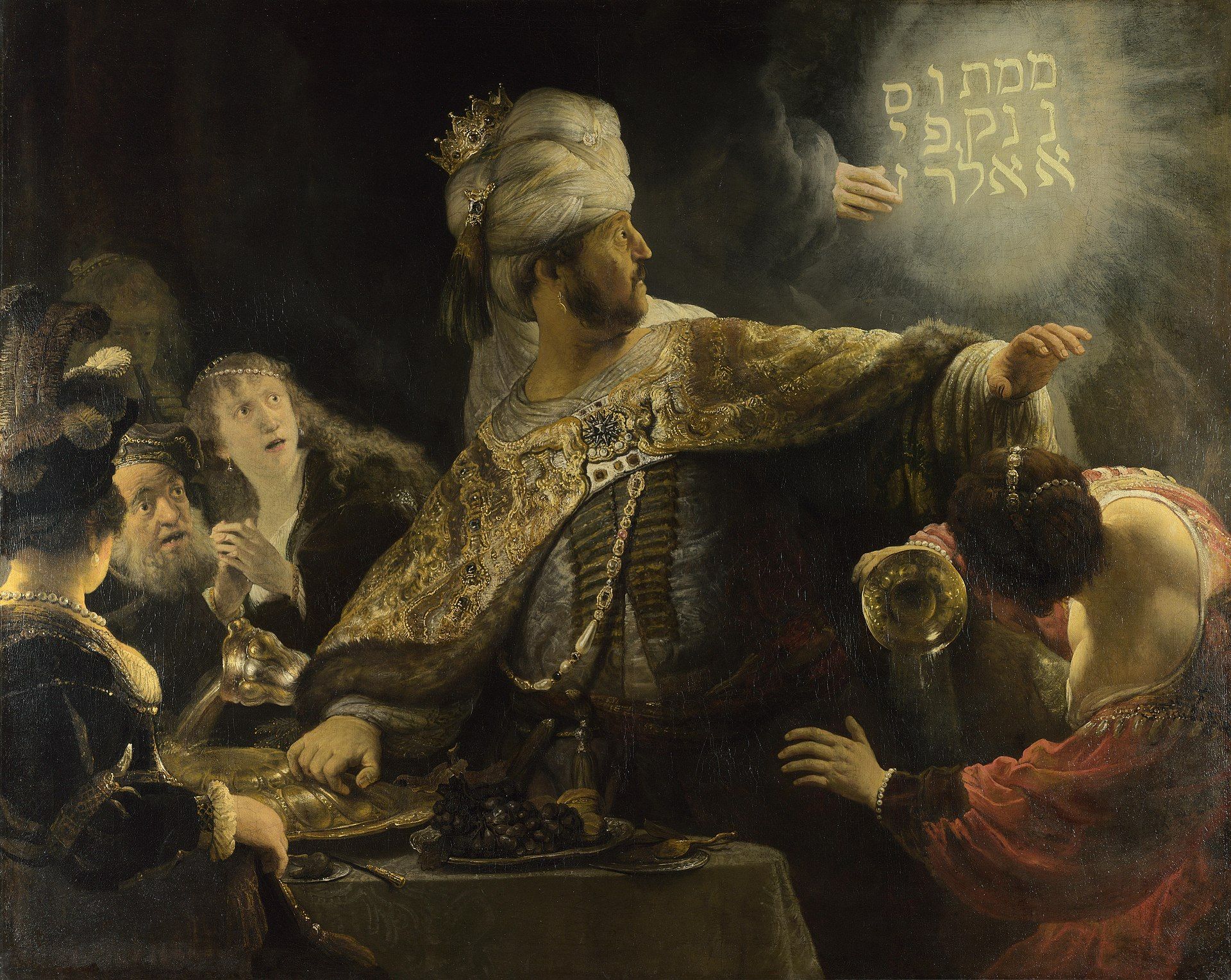 Belshazzar sees the handwriting on the wall.